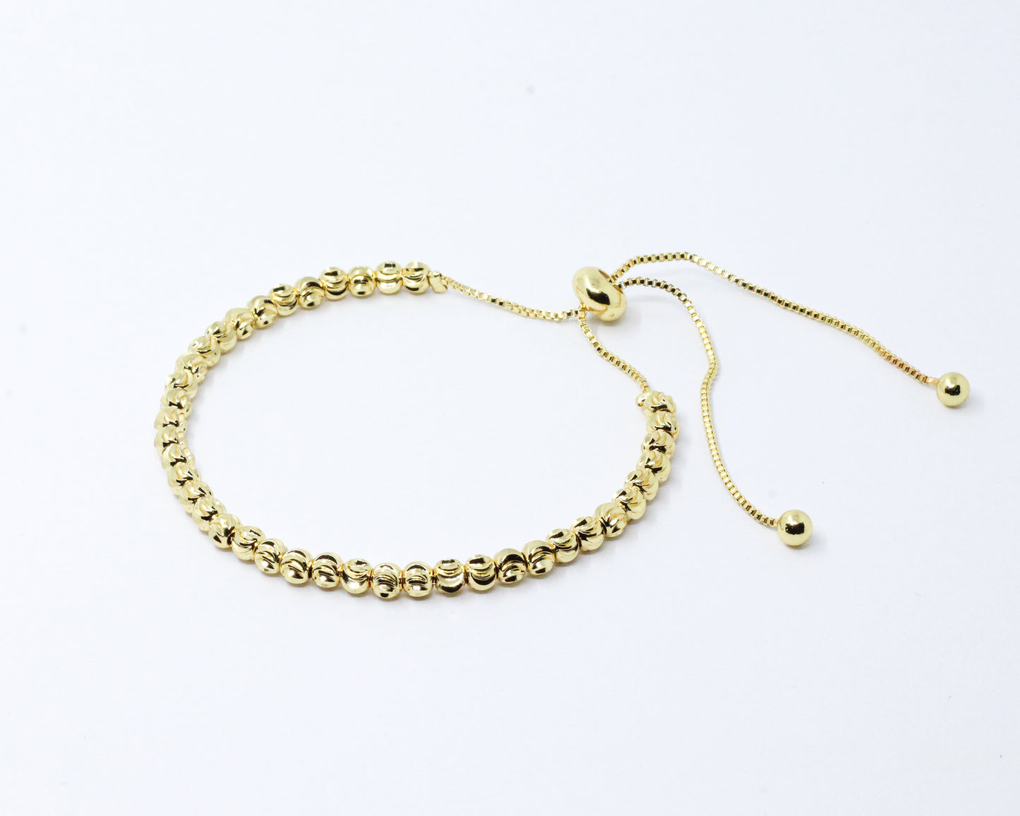 Pulsera Dorada Balines Diamantados