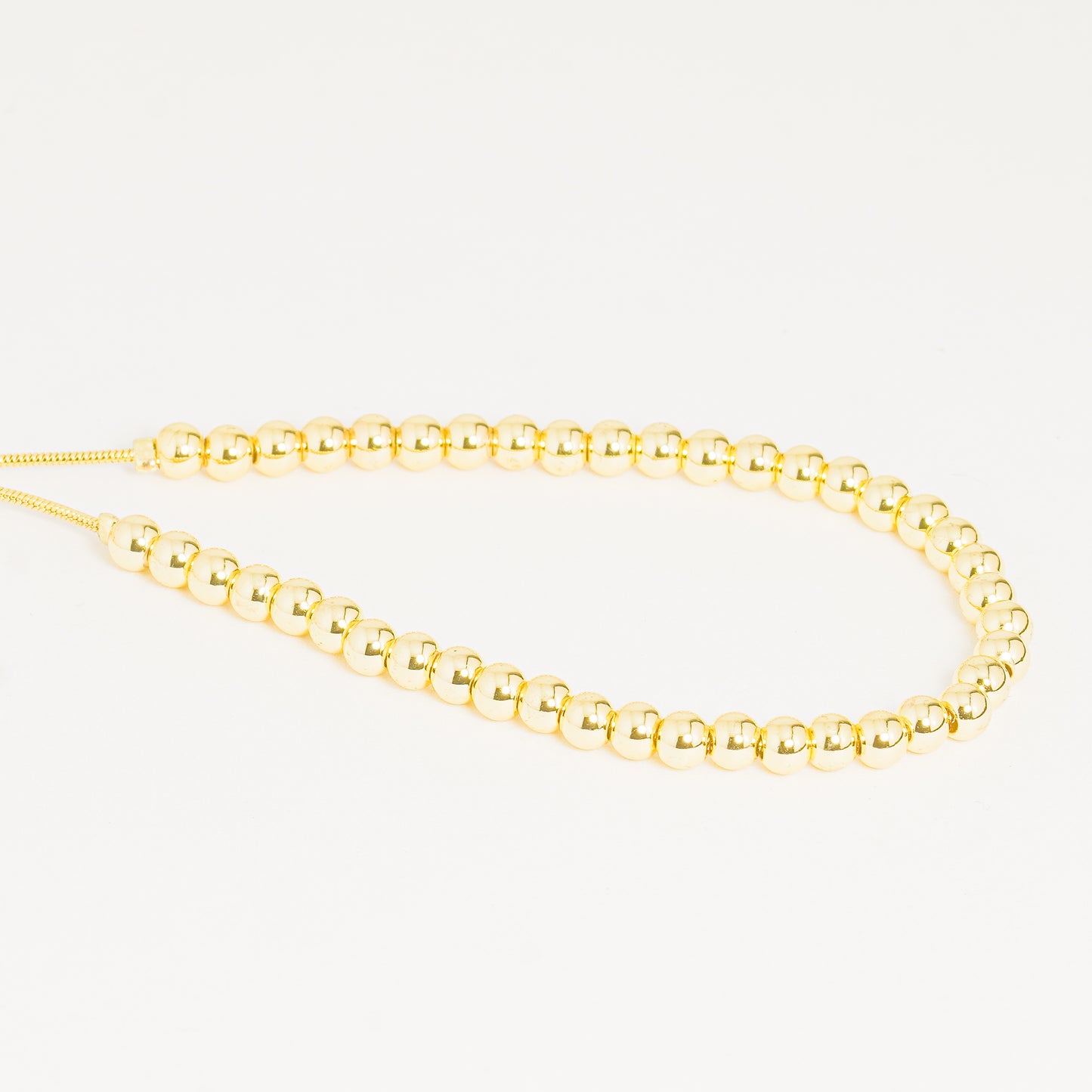 Pulsera Esferas Doradas