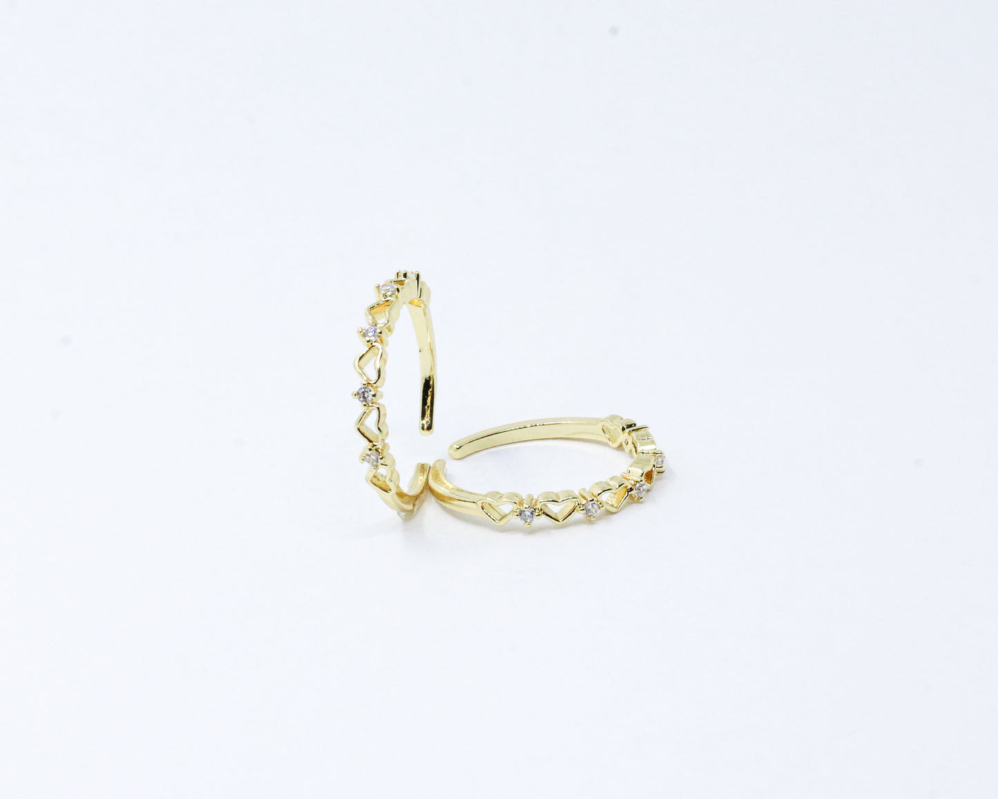 Anillo dorado corazones brillando