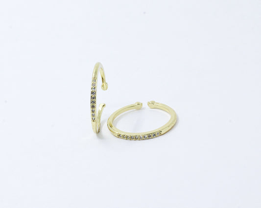Anillo dorado y brillos