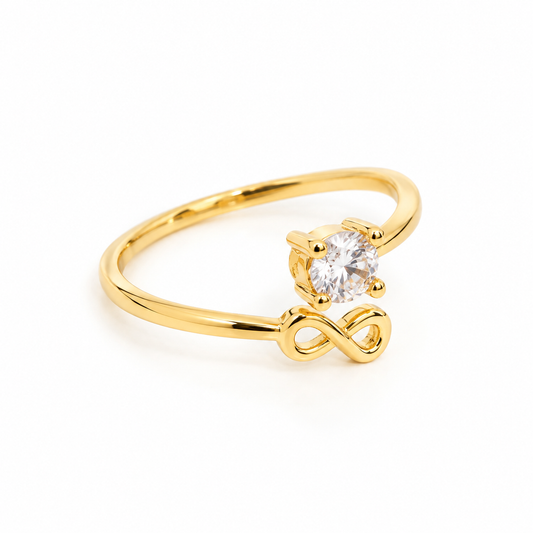 Anillo dorado infinito brillante