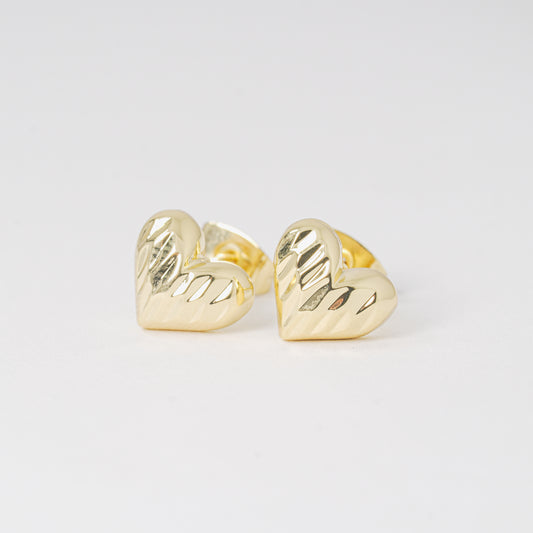 Topo corazón dorado