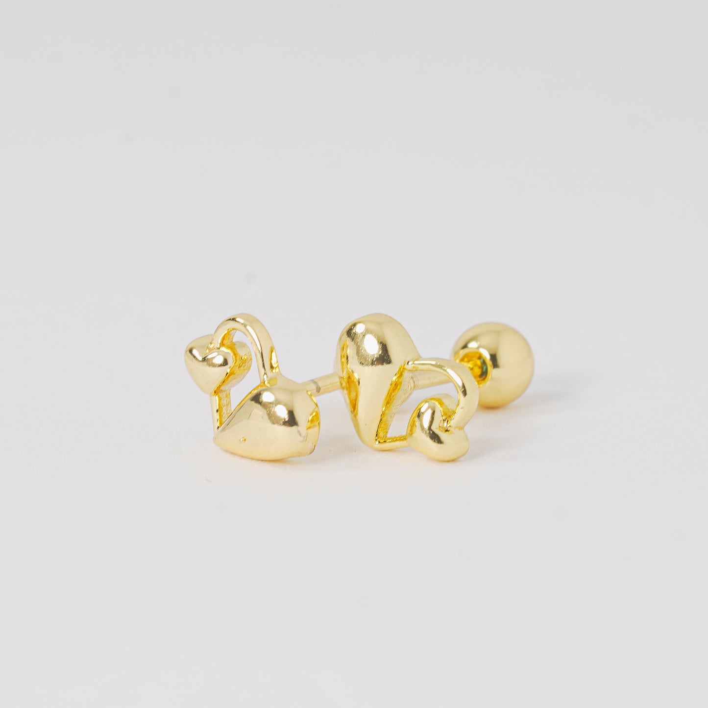 Topos corazones dorados