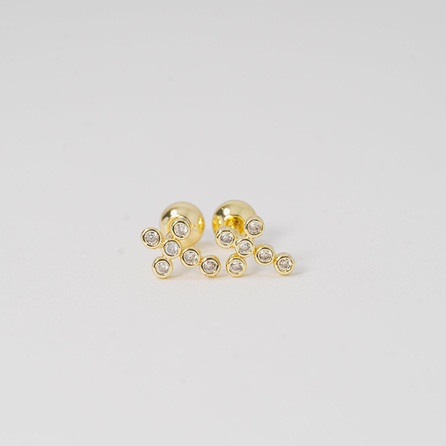 Topo dorado cruz circones