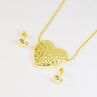 Set de topos y collar corazones dorados con textura vista 1