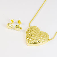 Set de topos y collar corazones dorados con textura vista 2