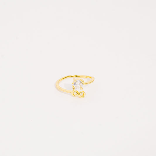 Anillo dorado infinito brillante