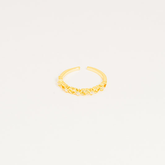 Anillo dorado corazones brillando