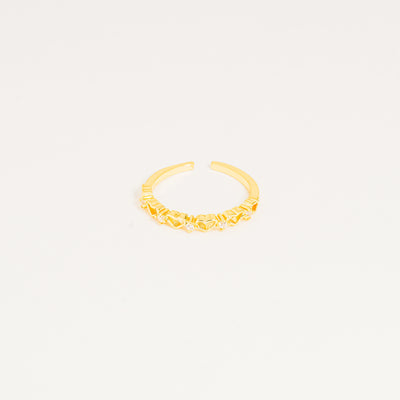 Anillo dorado corazones brillando