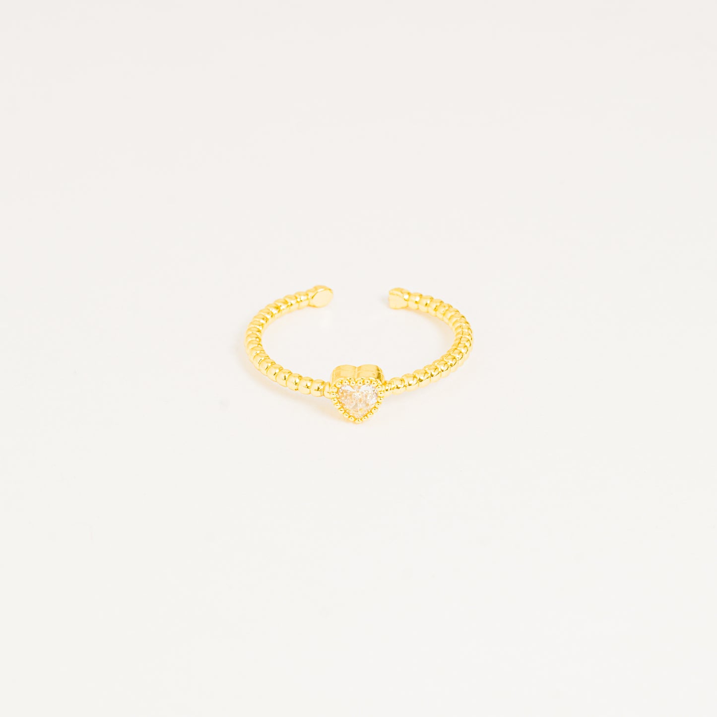 Anillo dorado único corazón