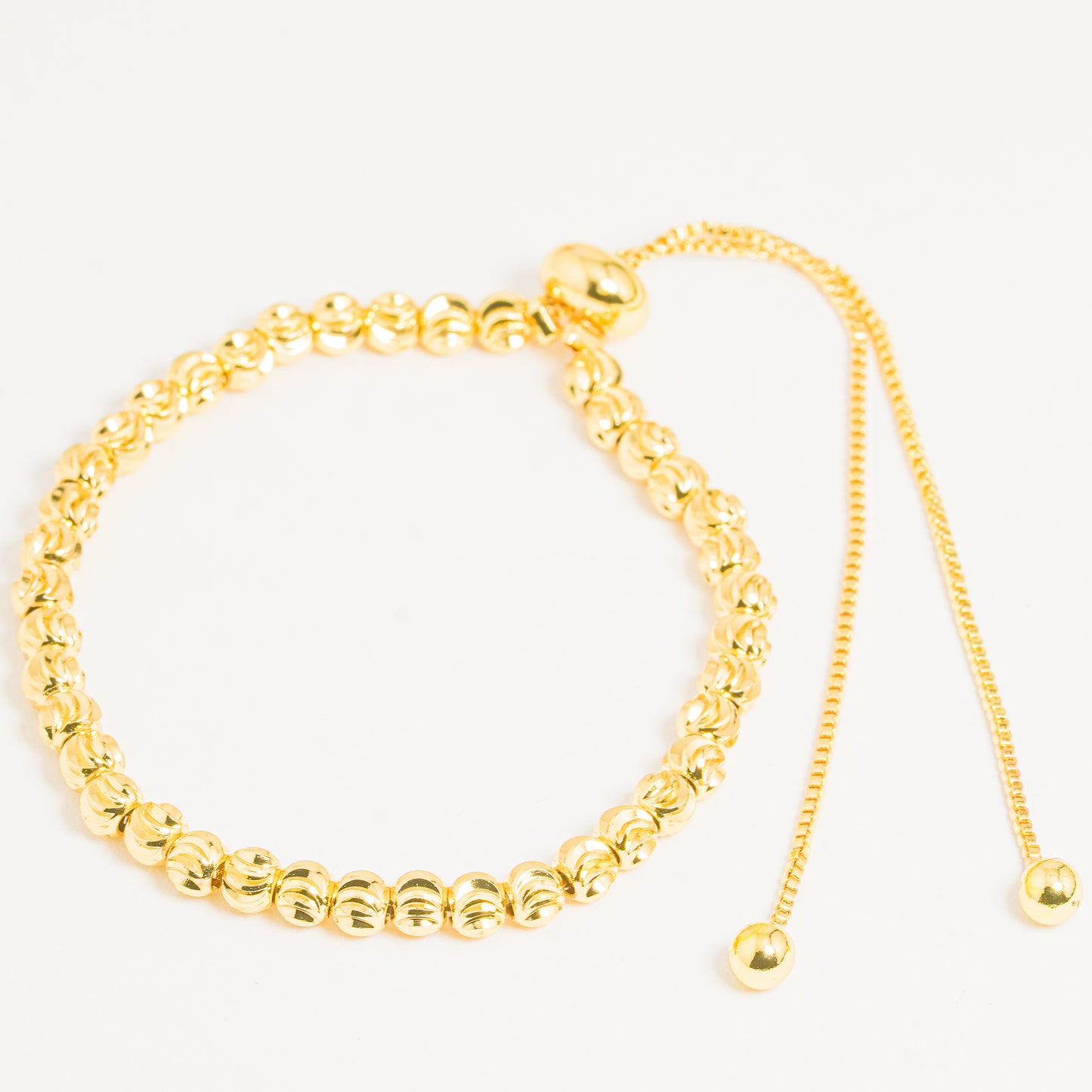 Pulsera Dorada Balines Diamantados