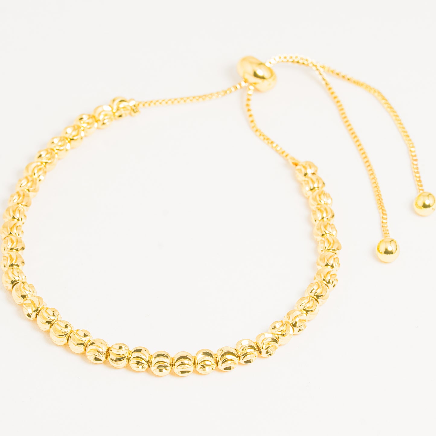 Pulsera Dorada Balines Diamantados