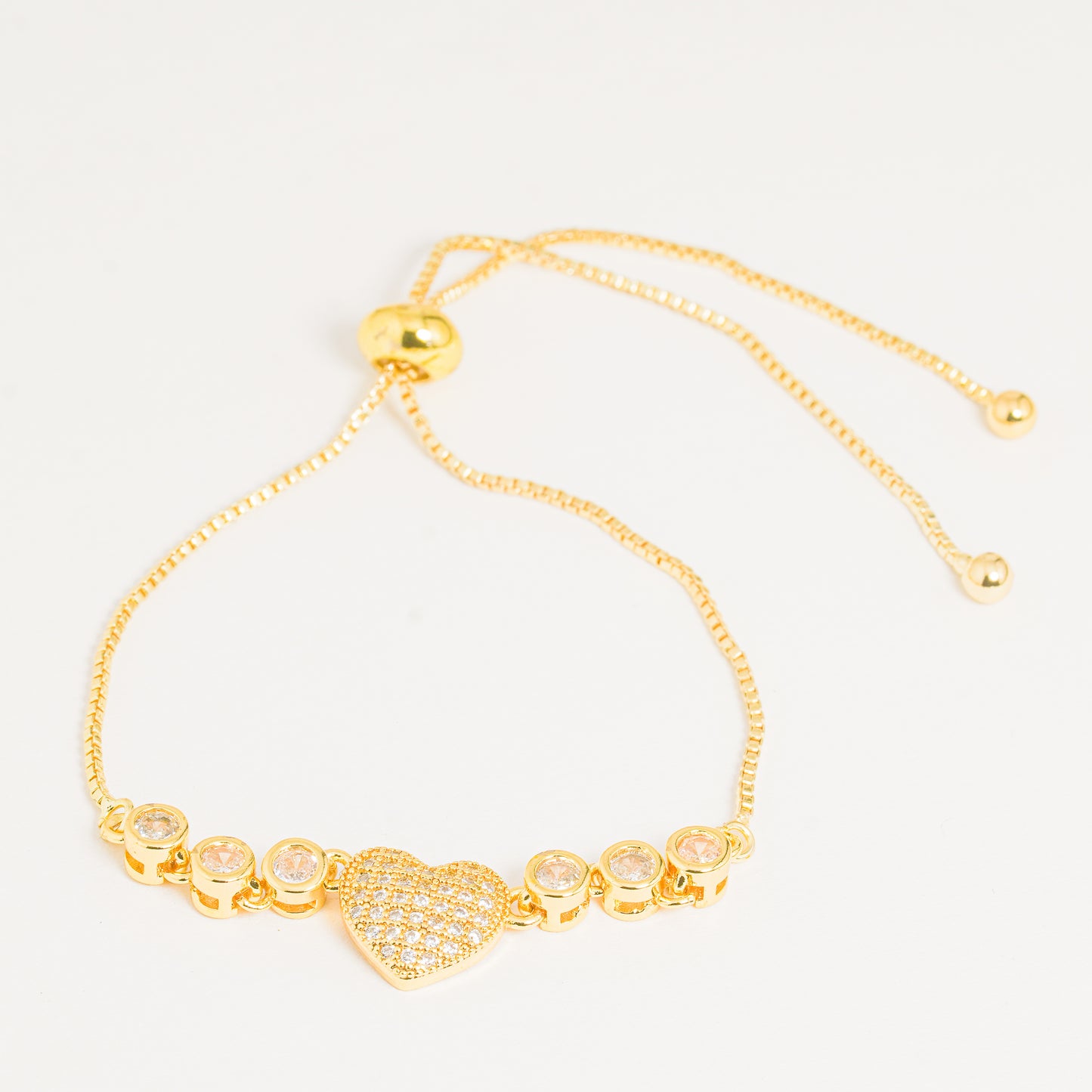 Pulsera Dorada Corazón Bíseles Redondos