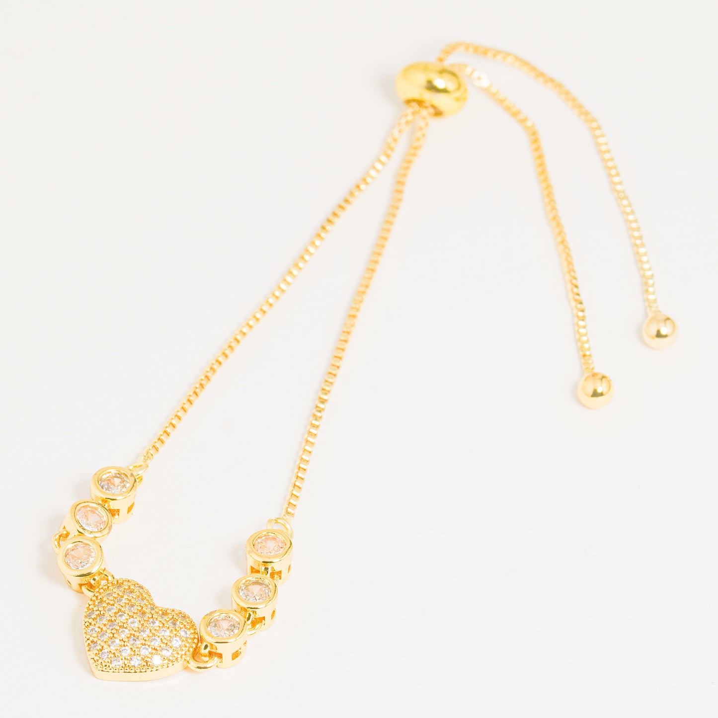 Pulsera Dorada Corazón Bíseles Redondos