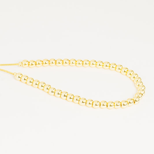 Pulsera Esferas Doradas